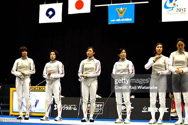 Siho Nishioka and Chieko Sugawara and Kyomi Hirata and Chie Yoshizawa of Japan start of in the Women's Foil Team Tableau of final on day four of the...