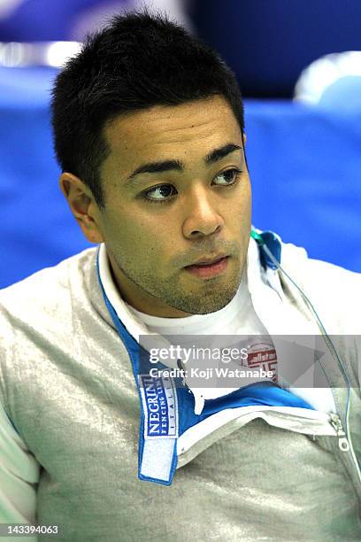 Daiki Fujino of Japan looks on in the Men's Foil Team Tableau of 8 on day four of the 2012 Asian Fencing Championships at Wakayama Big Wave on April...