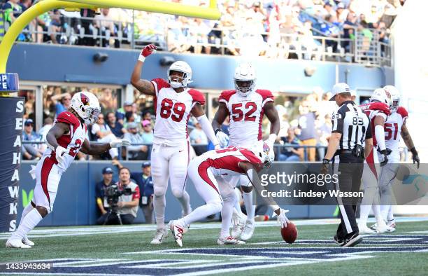 Chris Banjo of the Arizona Cardinals celebrates a fumble recovery for a touchdown against the Seattle Seahawks during the third quarter at Lumen...
