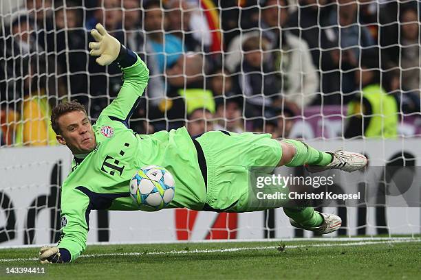 Manuel Neuer of Bayern saves a penalty of Cristiano Ronaldo of Real Madrid (not in the pictuKarim Benzemaduring the UEFA Champions League semi final...