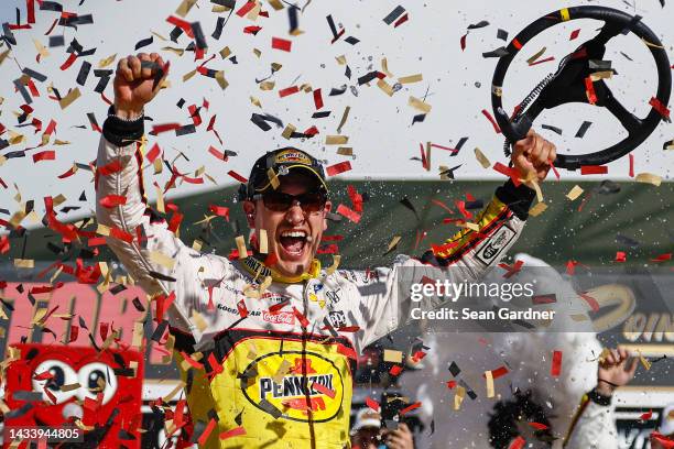 Joey Logano, driver of the Shell Pennzoil Ford, celebrates in victory lane after winning the NASCAR Cup Series South Point 400 at Las Vegas Motor...