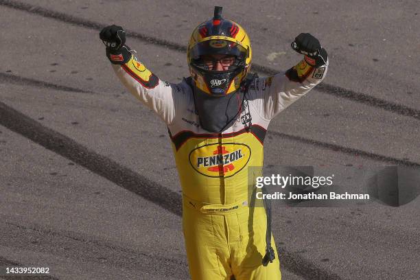 Joey Logano, driver of the Shell Pennzoil Ford, celebrates after winning the NASCAR Cup Series South Point 400 at Las Vegas Motor Speedway on October...