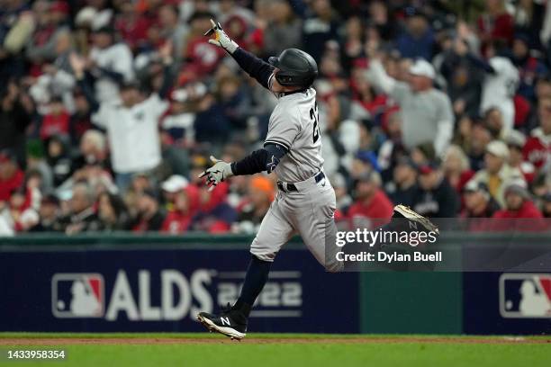 Harrison Bader of the New York Yankees rounds the bases after hitting a two-run home run against the Cleveland Guardians during the second inning in...