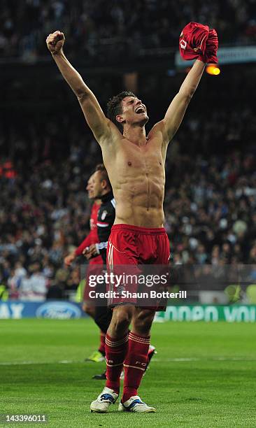 Mario Gomez of Bayern Munich celebrates with fans after scoring the winning penalty during the UEFA Champions League second leg semi-final match...