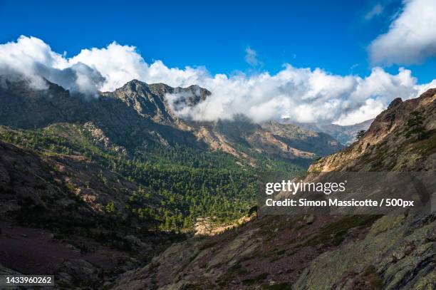 panoramic view of landscape against sky,monte cinto,corsica,france - cinto photos et images de collection