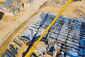 Building construction with a steel metal frame structure and steel metal beams as the main structure