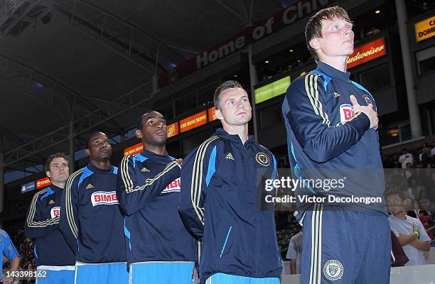 Chris Albright, Danny Mwanga, Amobi Okugo, Jack McInerney and back-up goalkeeper Chase Harrison of Philadelphia Union stand for the singing of the...