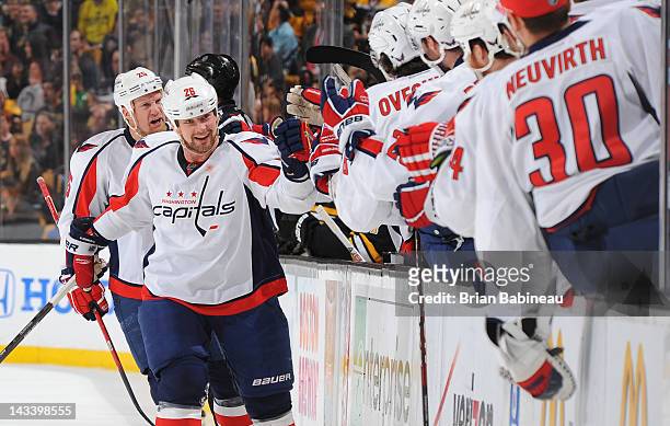 Matt Hendricks of the Washington Capitals celebrates a goal against the Boston Bruins in Game Seven of the Eastern Conference Quarterfinals during...