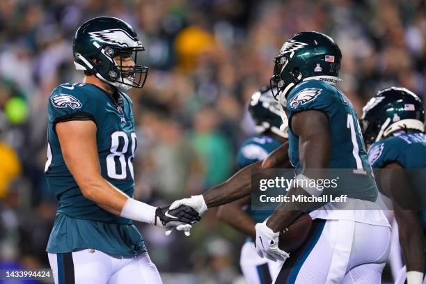 Brown celebrates with Dallas Goedert of the Philadelphia Eagles after scoring a touchdown in the second quarter of the game against the Dallas...