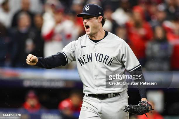 Gerrit Cole of the New York Yankees reacts after a strikeout against the Cleveland Guardians during the seventh inning in game four of the American...