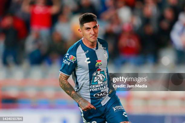 Victor Guzman of Pachuca celebrates after scoring his team's first goal during the quarterfinals second leg match between Pachuca and Tigres UANL as...