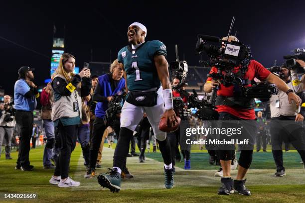 Jalen Hurts of the Philadelphia Eagles celebrates as he walks off the field after defeating the Dallas Cowboys 26-17 at Lincoln Financial Field on...