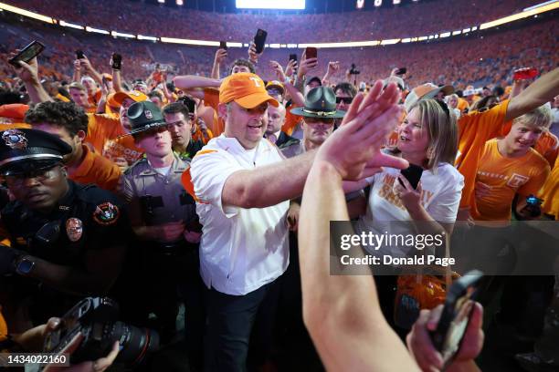 Head coach Josh Heupel of the Tennessee Volunteers celebrates the win over the Alabama Crimson Tide at Neyland Stadium on October 15, 2022 in...