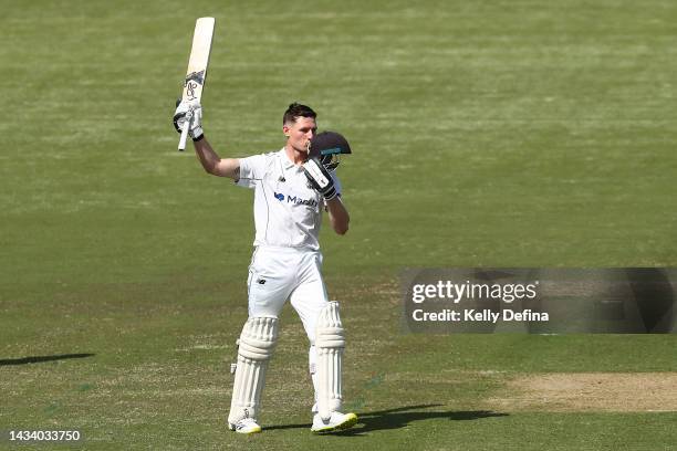 Cameron Bancroft of WA raises his bat after scoring a century during the Sheffield Shield match between Victoria and Western Australia at CitiPower...