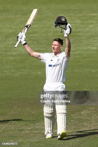 Cameron Bancroft of WA raises his bat after scoring a century during the Sheffield Shield match between Victoria and Western Australia at CitiPower...