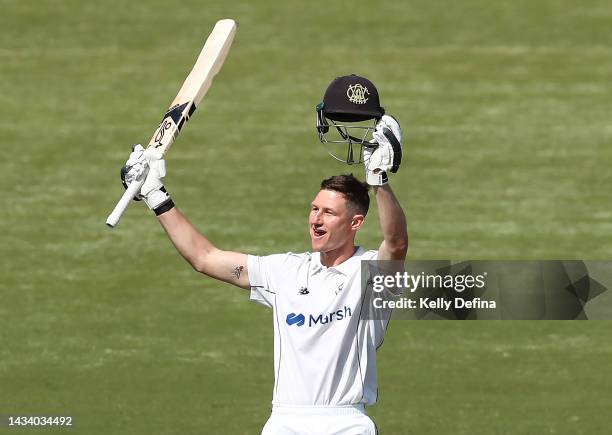 Cameron Bancroft of WA raises his bat after scoring a century during the Sheffield Shield match between Victoria and Western Australia at CitiPower...