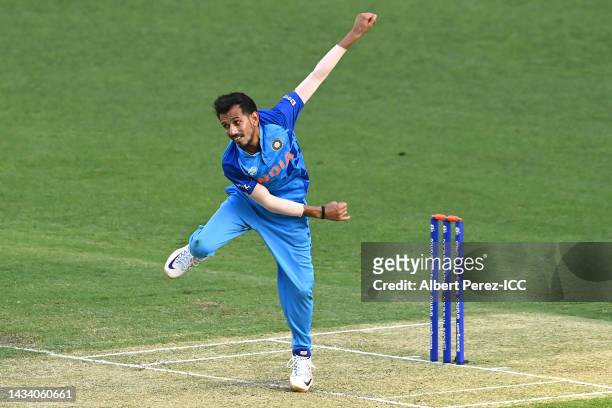 Yuzvendra Chahal of India bowls during the ICC 2022 Men's T20 World Cup Warm Up Match between Australia and India at The Gabba on October 17, 2022 in...
