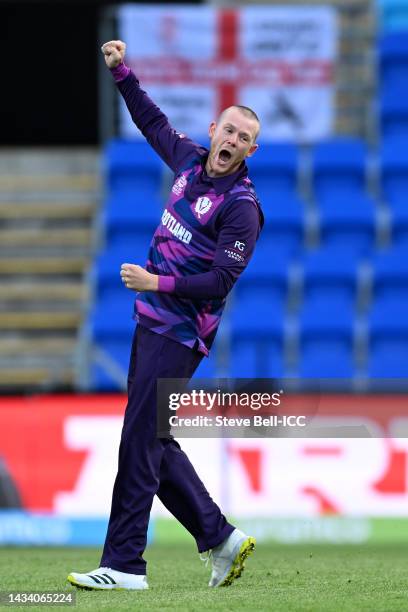 Michael Leask of Scotland celebrates after taking the wicket of Rovman Powell of the West Indies during the ICC Men's T20 World Cup match between...