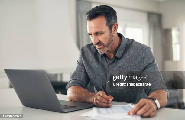 mature man, laptop or paper finance for bank loan, trading investment or life insurance savings in house. thinking remote worker, trader or stock market broker with tech and budget planning documents - command and control imagens e fotografias de stock