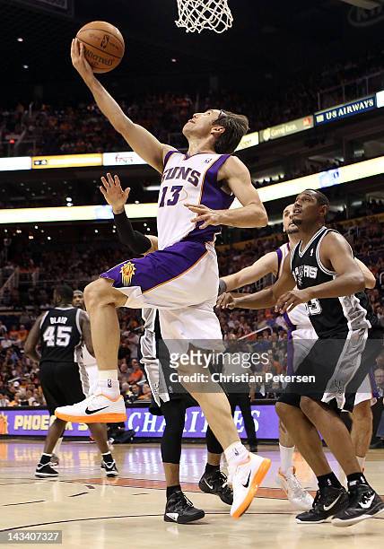 Steve Nash of the Phoenix Suns lays up a shot against the San Antonio Spurs during the NBA game at US Airways Center on April 25, 2012 in Phoenix,...