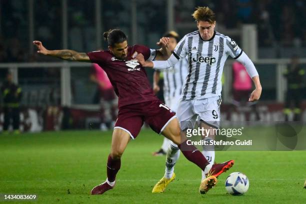 Ricardo Rodriguez of Torino FC against Dusan Vlahovic of Juventus FC during the Serie A match between Torino FC and Juventus at Stadio Olimpico di...