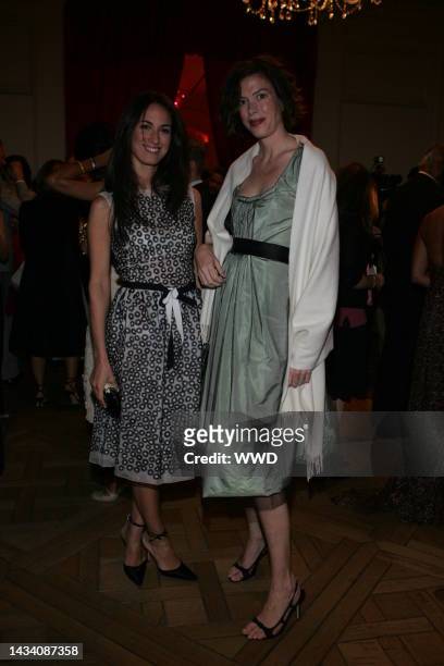 Anna Pinheiro and a guest attend Bergdorf Goodman\'s Oscar de la Renta 35th anniversary party.