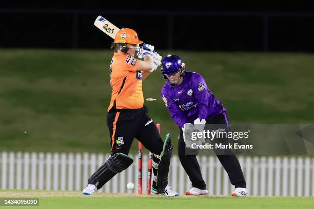 Sophie Devine of the Scorchers is bowled by Molly Strano of the Hurricanes during the Women's Big Bash League match between the Hobart Hurricanes and...