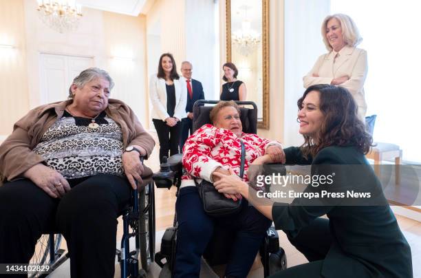 The president of the Community of Madrid, Isabel Diaz Ayuso , greets a group of users of the Residencia de Mayores, Amavir Nuestra Casa, in Collado...