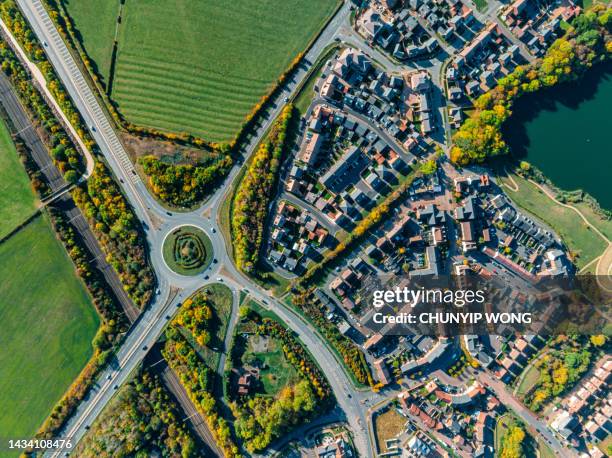 aerial view of a uk roundabout - urban road sign stock pictures, royalty-free photos & images