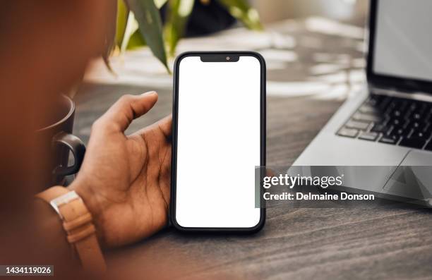 blank phone green screen and mockup space of a mobile screen in a office using technology. busy woman employee hand working on social media content app scroll and contact planning a digital project - device screen mockup stock pictures, royalty-free photos & images