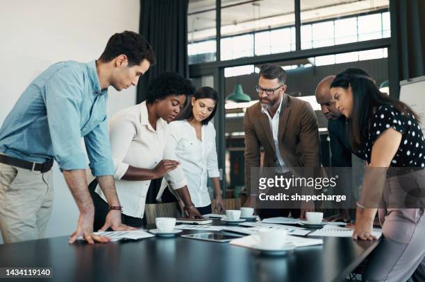 business people planning, collaboration and teamwork on a startup project in an advertising or marketing company. team of professional workers working on strategy with data meeting and paperwork - responsibility office stock pictures, royalty-free photos & images