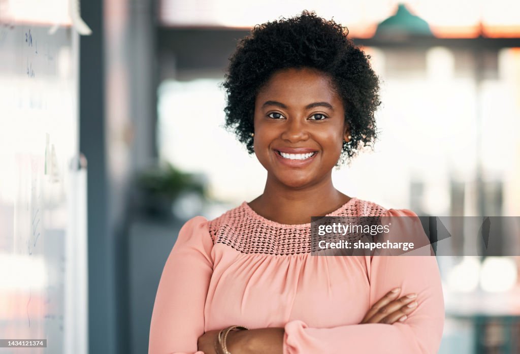 Happy, smile and business leadership black woman, entrepreneur and manager in New York modern office. Portrait face female executive boss working for motivation, vision and trust in startup company