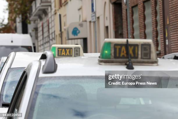 Several parked cabs on October 17 in Madrid, Spain. Madrid cab drivers can apply from January 1 a 15 percent discount in the pre-contracting of the...