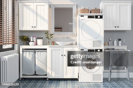 Modern Bathroom With Washing Machine, Dryer, White Cabinets and Drying Rack Modern Bathroom With Washing Machine, Dryer, White Cabinets and Drying Rack