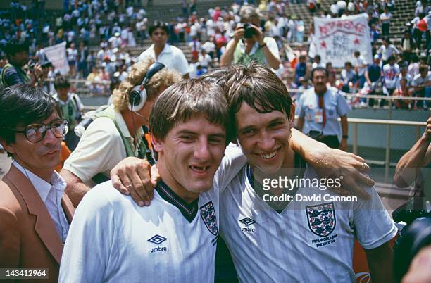 England players Peter Beardsley and Gary Lineker after their team beat Paraguay 3-0 in a Round of 16 match during the World Cup competition at the...
