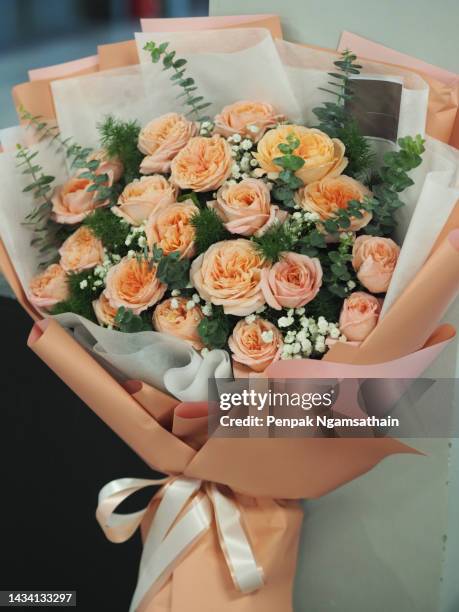 old rose flower bouquer boom beautiful - roses wrapped stock pictures, royalty-free photos & images