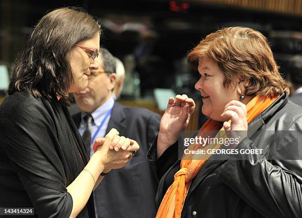 Commissioner for Home Affairs Cecilia Malmstroem speaks with Belgian State Secretary for Asylium and Immigration Maggie De Block prior to a Justice...