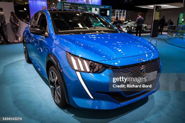 The new Peugeot E-208 is displayed on the Peugeot booth at Parc des Expositions Porte de Versailles on October 17, 2022 in Paris, France. The Paris...