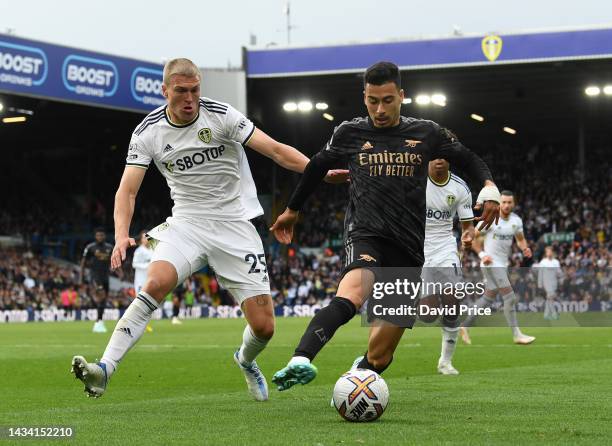 Gabriel Martinelli of Arsenal turns away from Rasmus Kristensen of Leeds during the Premier League match between Leeds United and Arsenal FC at...