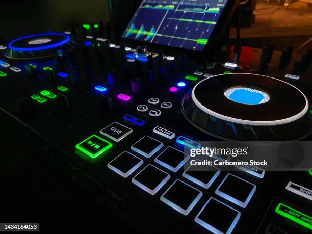 dj mixtable with colors in night club - equalizer bars stock pictures, royalty-free photos & images