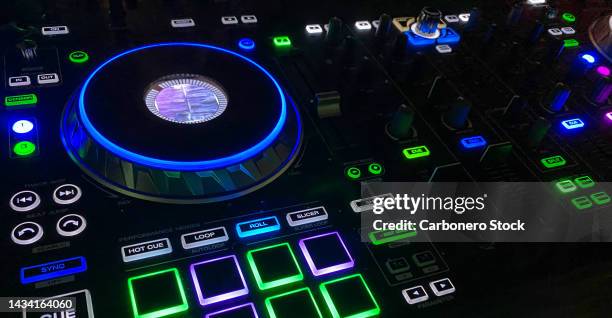 dj controller close up view in live performance night club dance music - equalizer bars stock pictures, royalty-free photos & images