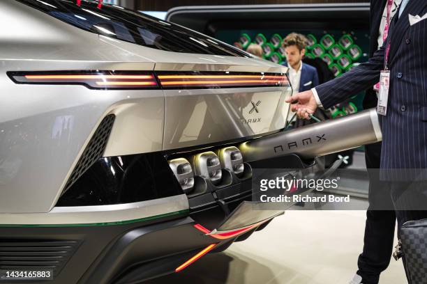 Six removable hydrogen capsules are seen at the back of the NamX HUV hydrogen car on the NamX booth during the "Mondial De L'Automobile" at Parc des...