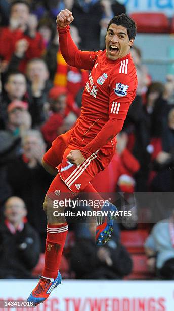 Liverpool's Uruguayan forward Luis Suarez celebrates after scoring the opening goal during the English FA Cup quarter final football match between...