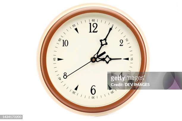 wall clock against white background - wall clock stock pictures, royalty-free photos & images