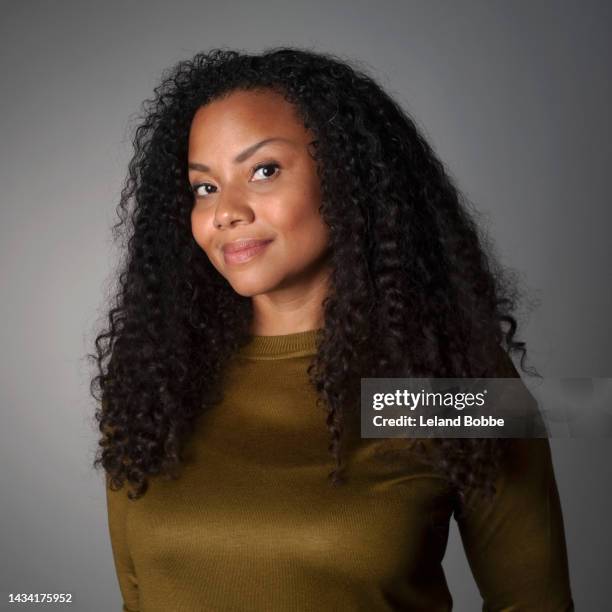 studio portrait of adult african american woman - tears of joy stock-fotos und bilder