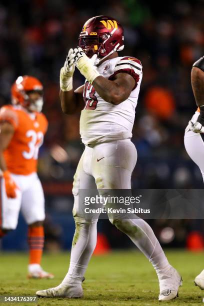 Jonathan Allen of the Washington Commanders celebrates during an NFL football game against the Chicago Bears at Soldier Field on October 13, 2022 in...