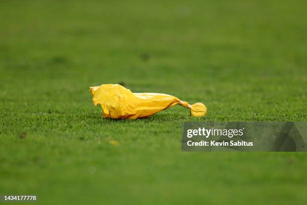 Detail shot of a yellow penalty flag on the field during an NFL football game between the Chicago Bears and the Washington Commanders at Soldier...