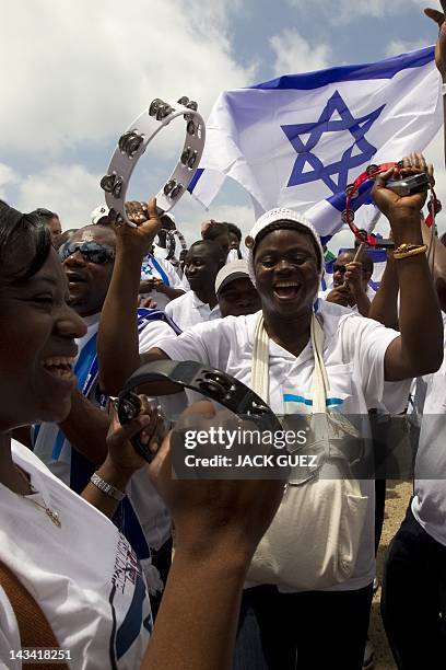 Christians Nigerians migrant workers members of the ''Redeemed Christian of Good '' dance during Israel's 64th Independence Day anniversary...