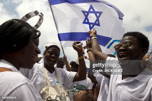 Christians Nigerians migrant workers members of the ''Redeemed Christian of Good '' dance during Israel's 64th Independence Day anniversary...