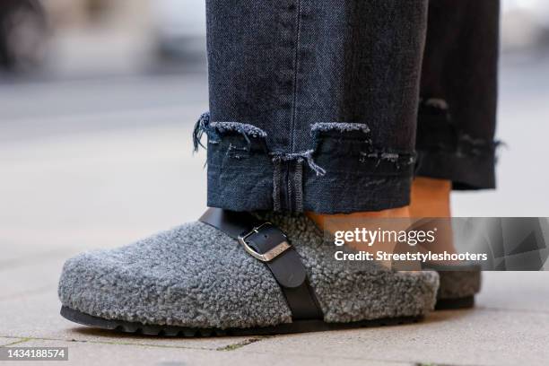 Stylist Bert Sterck wearing grey faux fur clogs by Scholl, all by loui.rocks during a street style shooting on October 17, 2022 in Dusseldorf,...